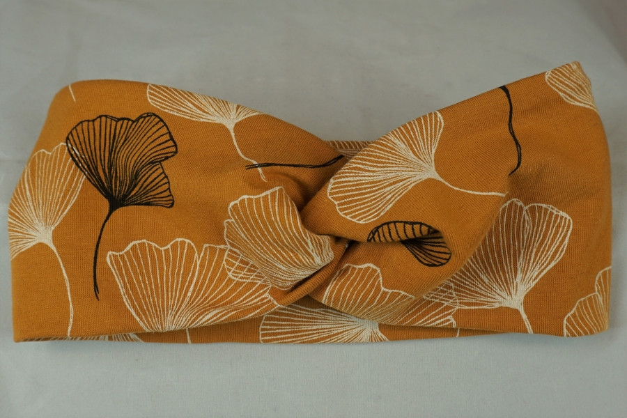 knotenstirnband-jersey-baumwolle-pepafarina-gelb-schwarz-creme-ginkomuster